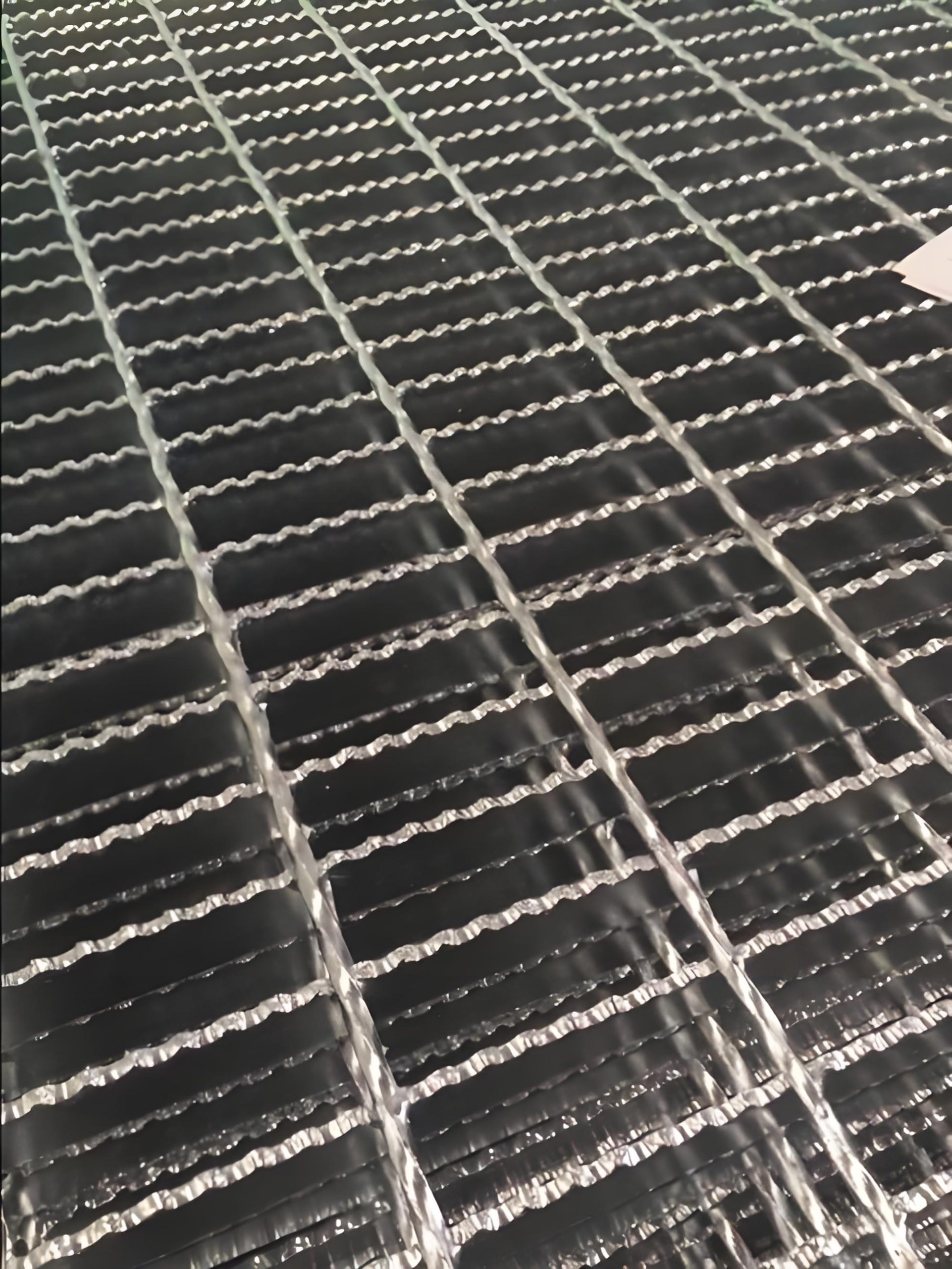 Industrial floor grating installation in factory
